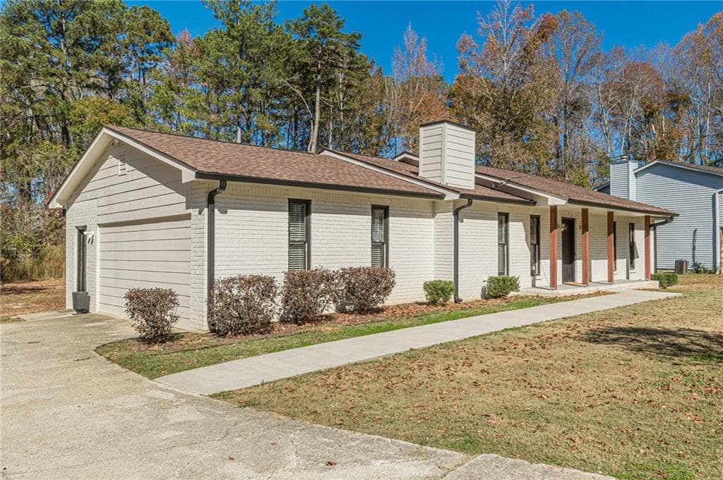 4 bedroom, 2 bathroom, 1,840 sq ft single family residence for sale at 9531 Winding Way Lane, Jonesboro, GA 30238 — photo 2