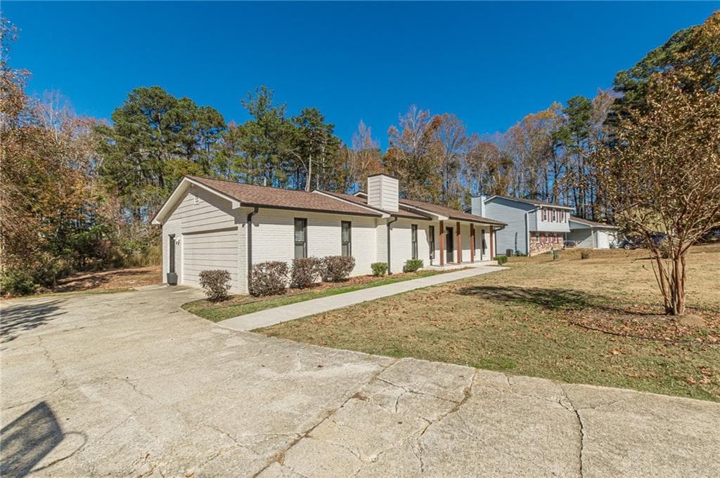 4 bedroom, 2 bathroom, 1,840 sq ft single family residence for sale at 9531 Winding Way Lane, Jonesboro, GA 30238 — photo 4