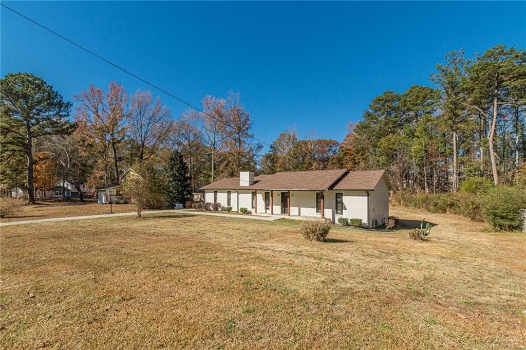 4 bedroom, 2 bathroom, 1,840 sq ft single family residence for sale at 9531 Winding Way Lane, Jonesboro, GA 30238 — photo 6