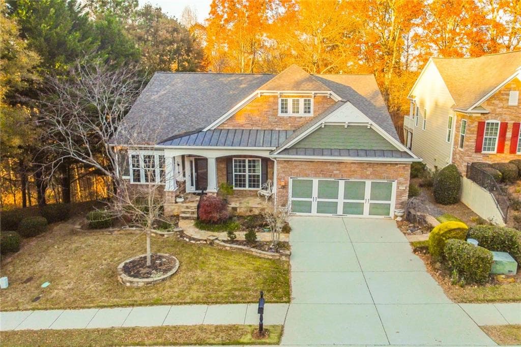 4 bedroom, 5 bathroom, 4,210 sq ft single family residence sold at 6352 Falling Water Lane, Hoschton, GA 30548