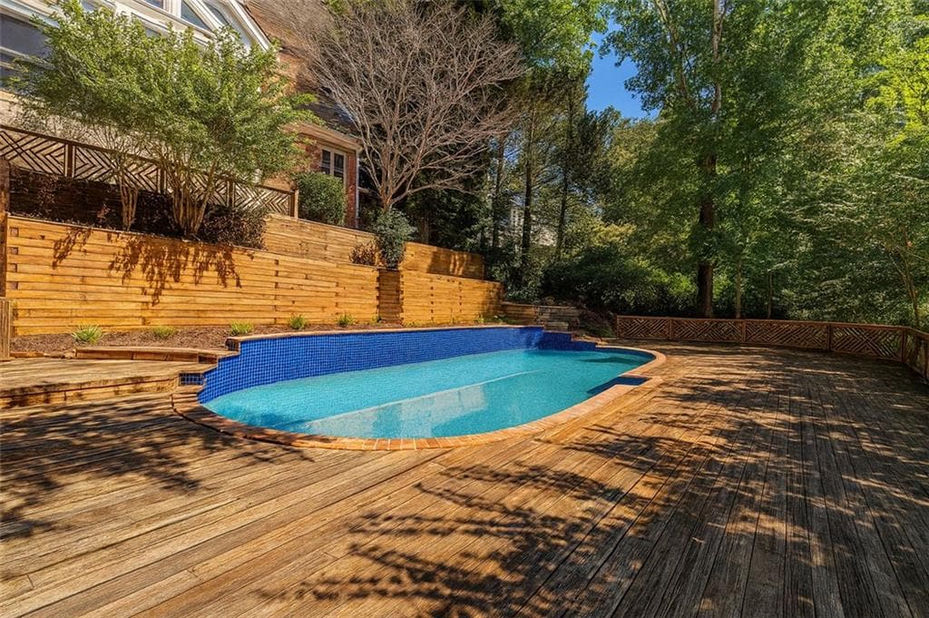 6 bedroom, 5 bathroom, 5,766 sq ft single family residence under contract at 4070 RUNNYMEDE Drive, Lilburn, GA 30047 — photo 9