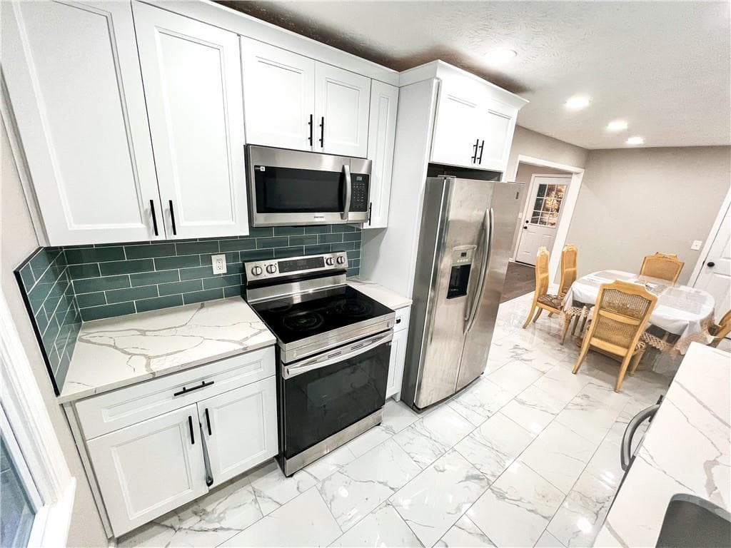 4 bedroom, 3 bathroom single family residence for sale at 6875 Graves Mill Court, Norcross, GA 30093 — photo 9