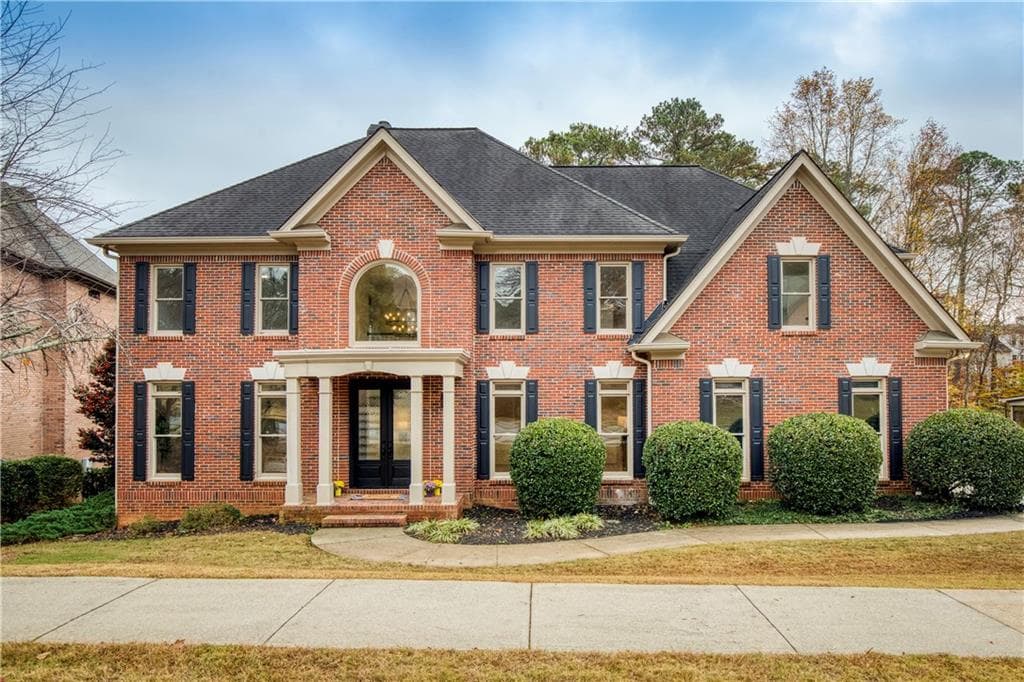 7 bedroom, 5 bathroom, 5,918 sq ft single family residence sold at 904 Stream Valley Trail, Alpharetta, GA 30022