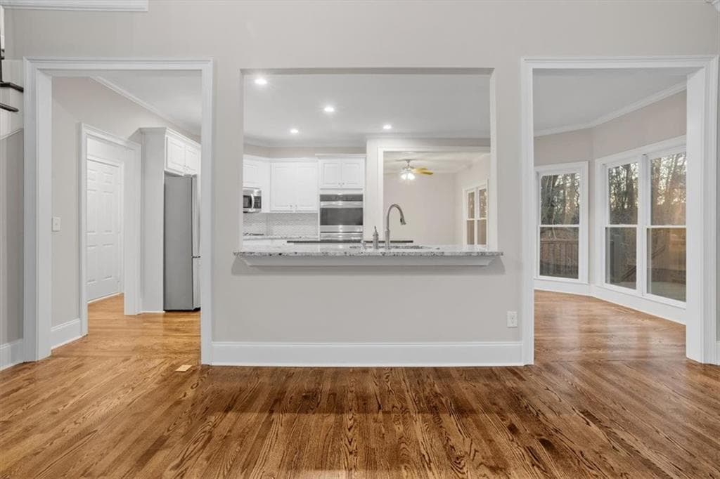 6 bedroom, 4 bathroom, 5,860 sq ft single family residence for sale at 226 Crescent Moon Way, Canton, GA 30114 — photo 9