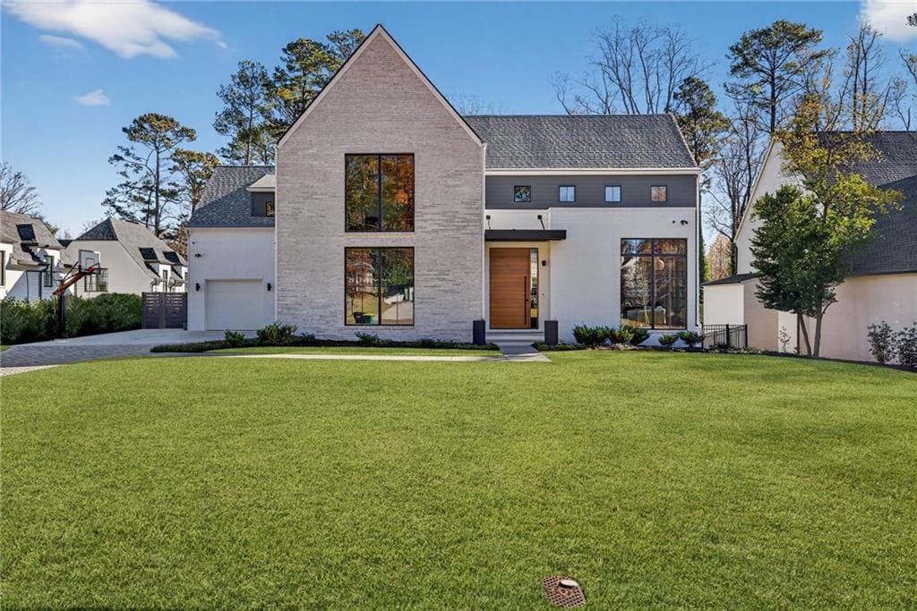5 bedroom, 7 bathroom, 7,297 sq ft single family residence sold at 4795 Merlendale Court, Atlanta, GA 30327
