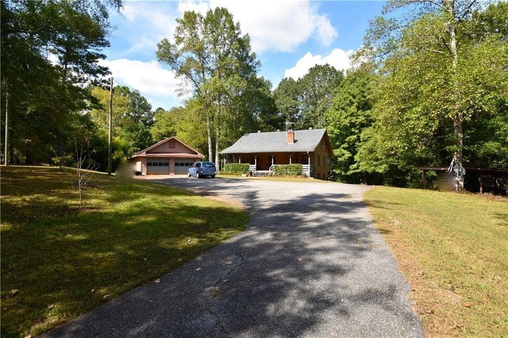 4 bedroom, 3 bathroom, 2,240 sq ft single family residence for sale at 15430 Thompson Road, Alpharetta, GA 30004 — photo 1 of 15