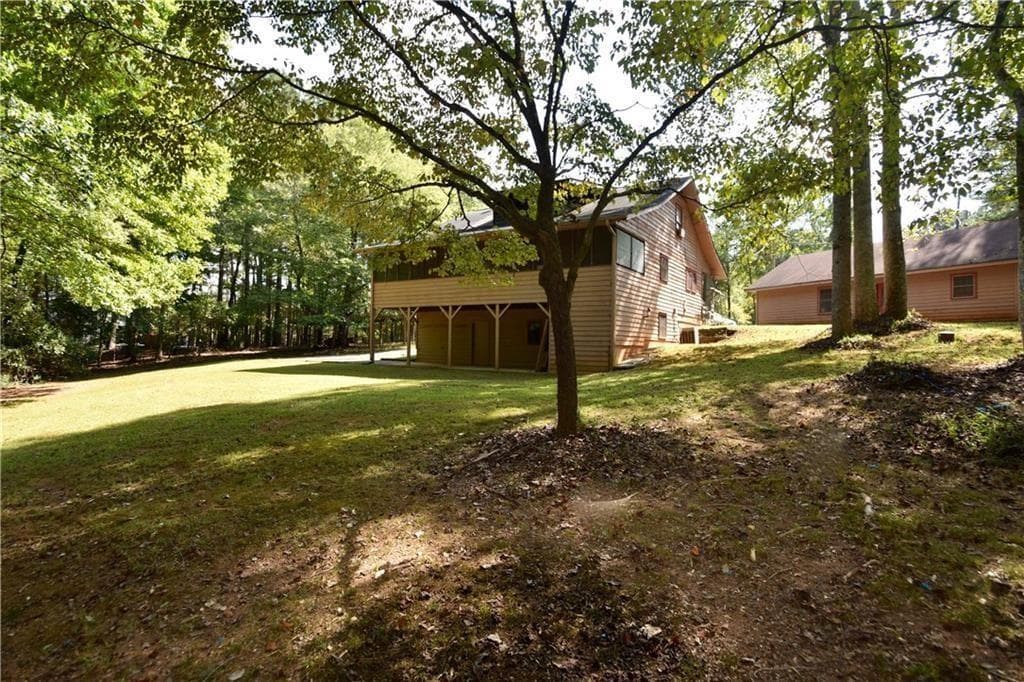 4 bedroom, 3 bathroom, 2,240 sq ft single family residence for sale at 15430 Thompson Road, Alpharetta, GA 30004 — photo 2