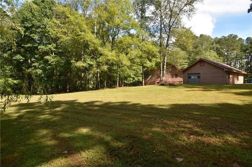 4 bedroom, 3 bathroom, 2,240 sq ft single family residence for sale at 15430 Thompson Road, Alpharetta, GA 30004 — photo 3