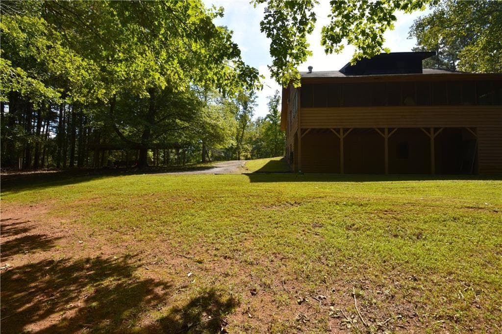 4 bedroom, 3 bathroom, 2,240 sq ft single family residence for sale at 15430 Thompson Road, Alpharetta, GA 30004 — photo 5