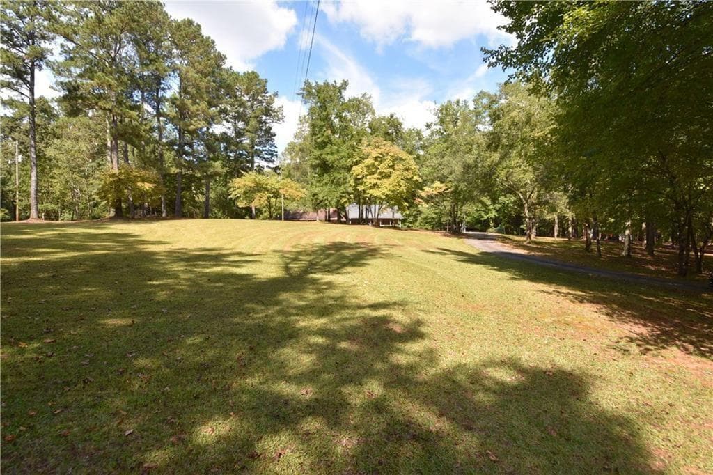 4 bedroom, 3 bathroom, 2,240 sq ft single family residence for sale at 15430 Thompson Road, Alpharetta, GA 30004 — photo 9