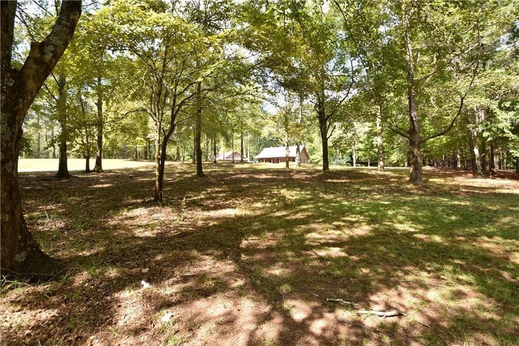 4 bedroom, 3 bathroom, 2,240 sq ft single family residence for sale at 15430 Thompson Road, Alpharetta, GA 30004 — photo 10