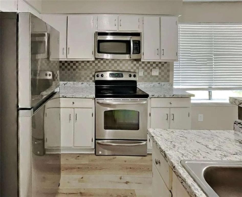3 bedroom, 2 bathroom, 1,406 sq ft condominium under contract at 8602 Creekwood Way, Jonesboro, GA 30238 — photo 4