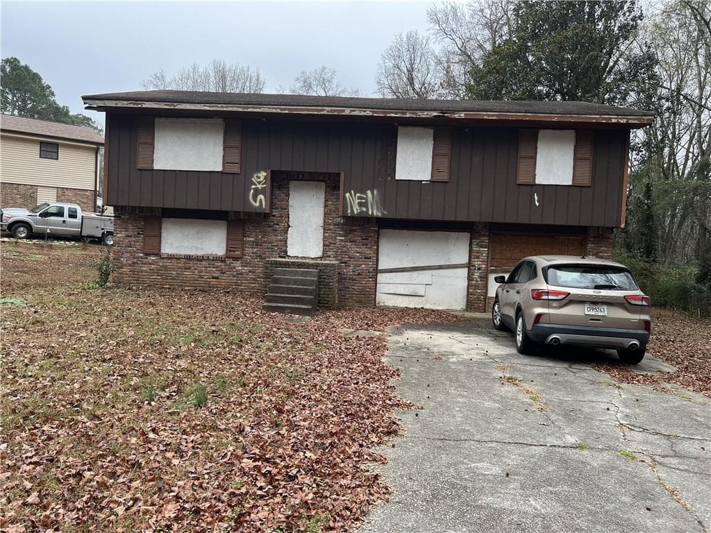 3 bedroom, 3 bathroom, 1,864 sq ft single family residence sold at 5827 Christopher Lane, Lithonia, GA 30058