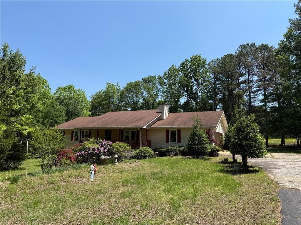 3 bedroom, 2 bathroom, 1,660 sq ft single family residence sold at 7260 Cox Road, Cumming, GA 30028