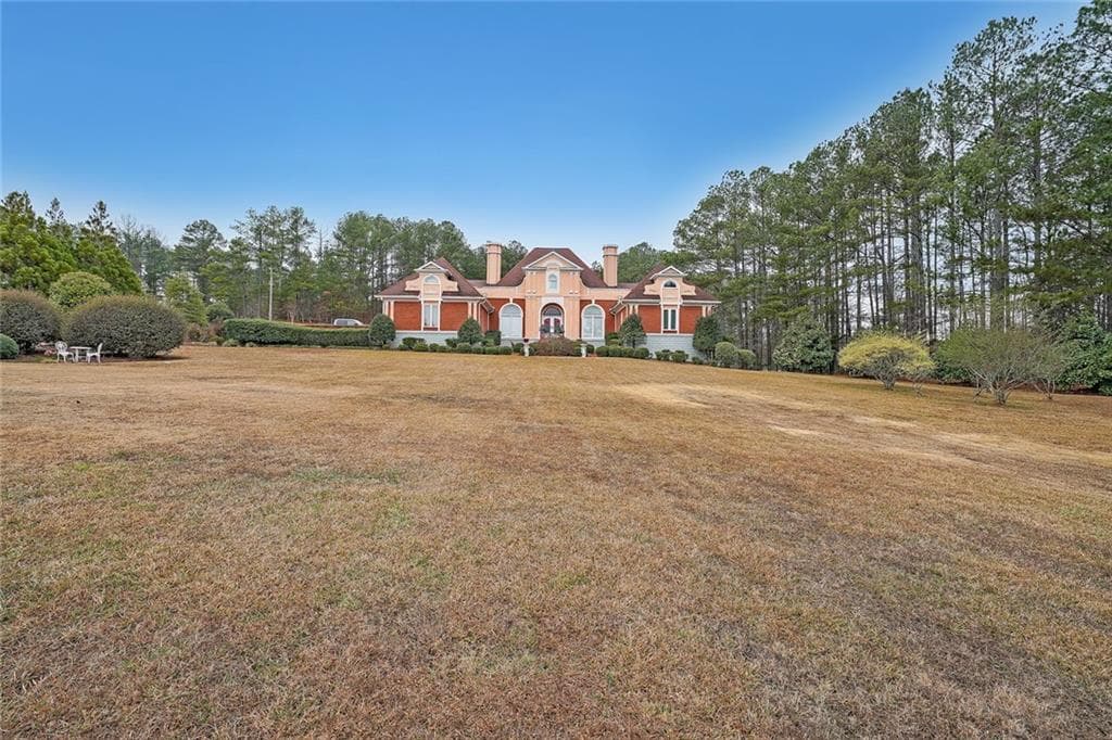 4 bedroom, 4 bathroom, 7,263 sq ft single family residence for sale at 1827 Poplar Springs Road, Hiram, GA 30141
