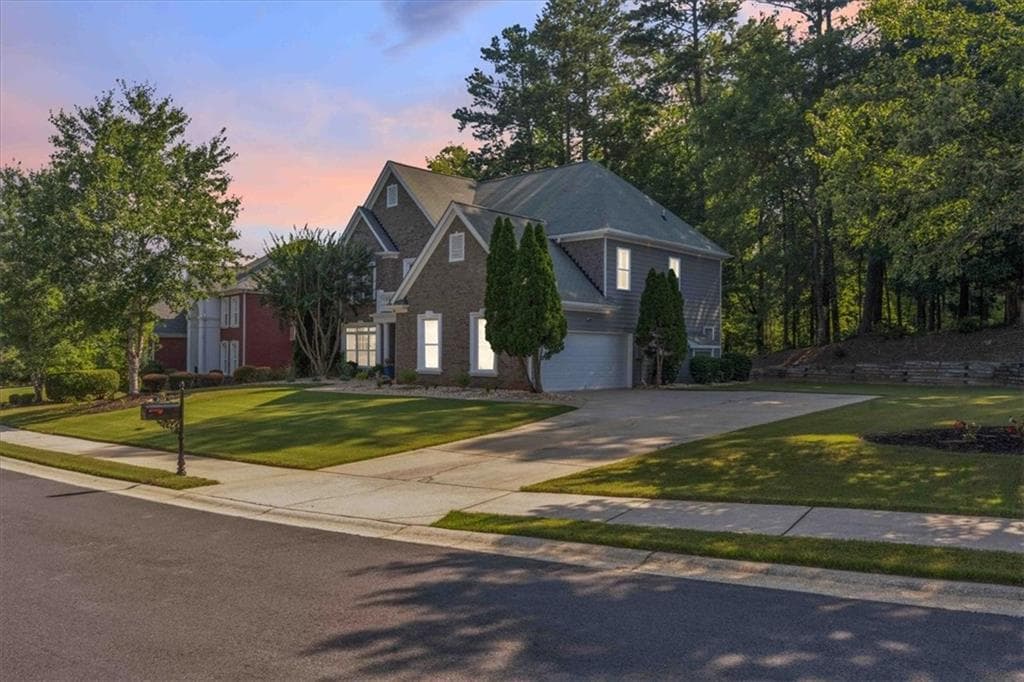 4 bedroom, 3 bathroom, 2,843 sq ft single family residence for sale at 3123 Wolf Club Drive, Atlanta, GA 30349 — photo 1 of 54