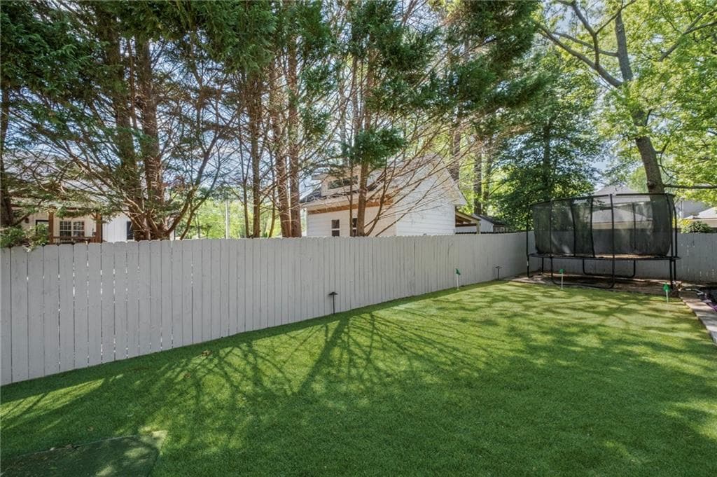 6 bedroom, 5 bathroom single family residence under contract at 8175 Main Street, Woodstock, GA 30188 — photo 8
