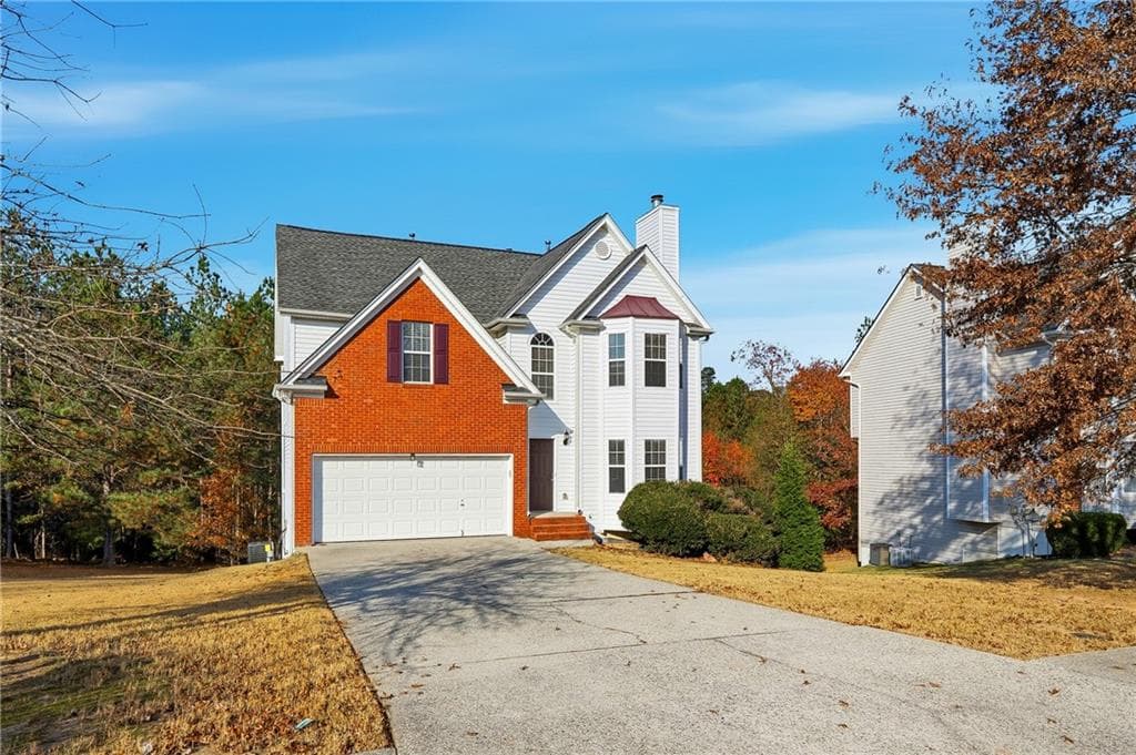 6 bedroom, 4 bathroom, 2,012 sq ft single family residence for sale at 1405 Bramlett Forest Trail, Lawrenceville, GA 30045 — photo 2