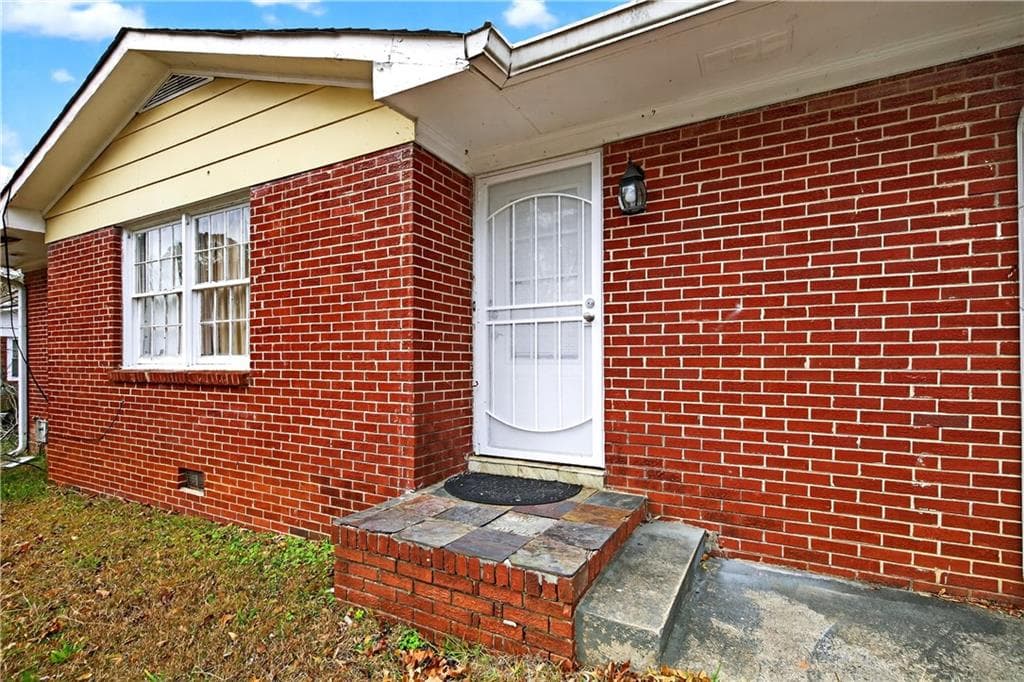 3 bedroom, 2 bathroom, 1,109 sq ft single family residence for sale at 1742 Cardinal Road, Jonesboro, GA 30238 — photo 2