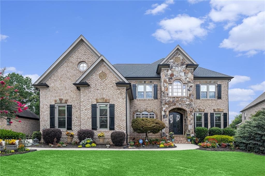 6 bedroom, 7 bathroom, 6,598 sq ft single family residence for sale at 2088 Skybrooke Court, Hoschton, GA 30548 — photo 1 of 50