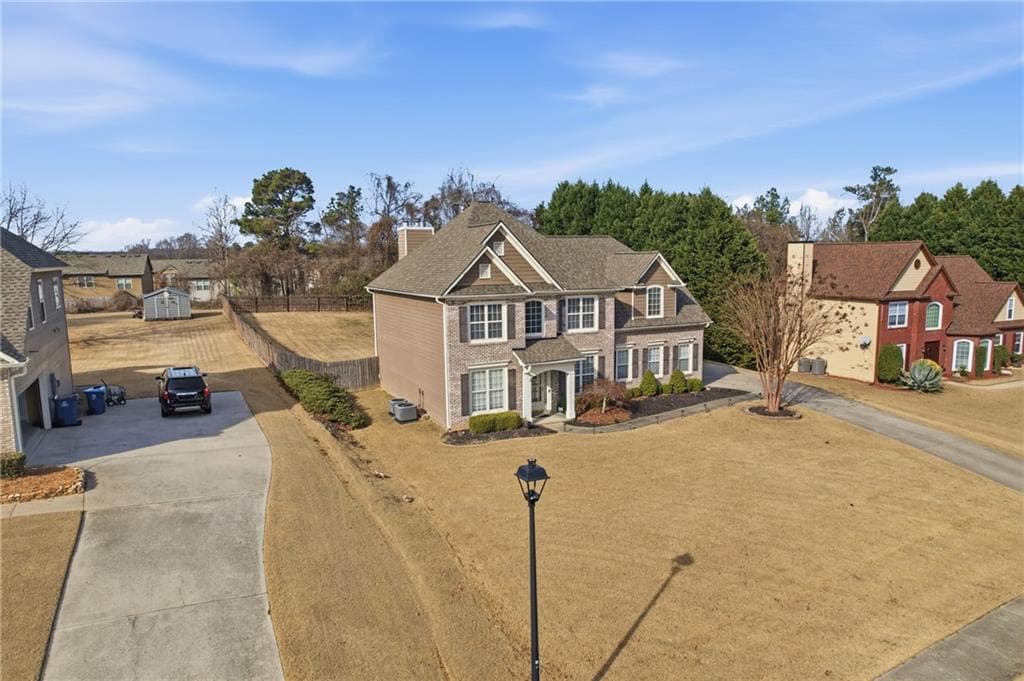 4 bedroom, 3 bathroom, 2,458 sq ft single family residence for sale at 2800 Barimore Place, Dacula, GA 30019 — photo 2