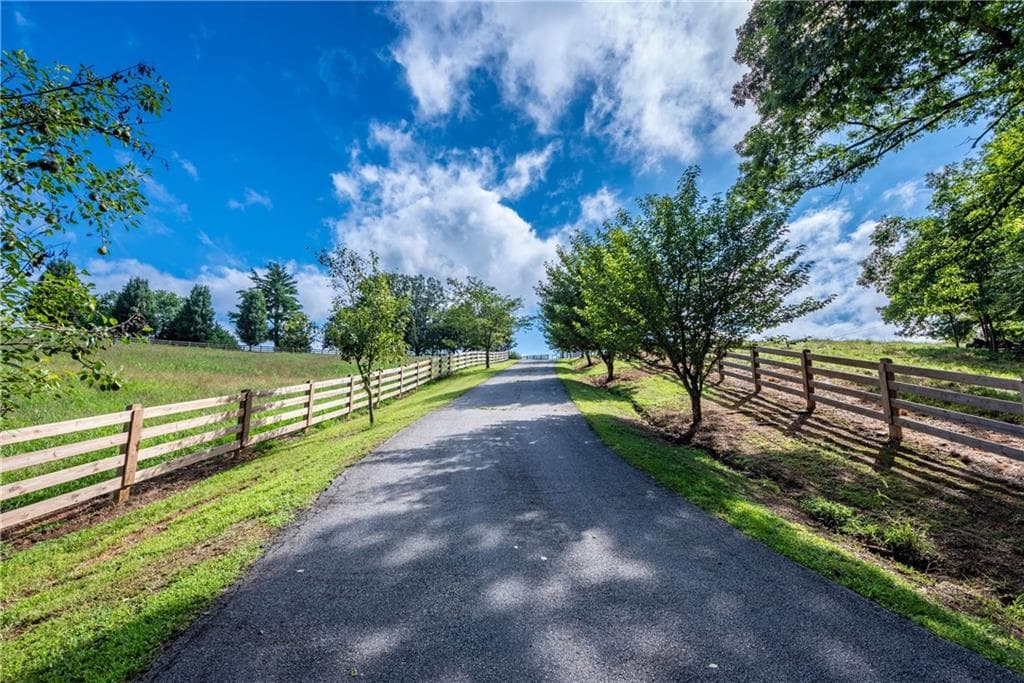 4 bedroom, 6 bathroom, 8,642 sq ft single family residence for sale at 755 Harris Road, Jasper, GA 30143 — photo 3