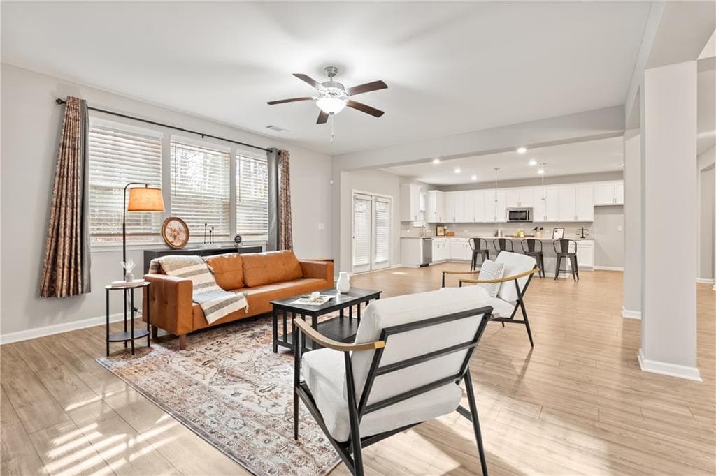 6 bedroom, 4 bathroom, 3,721 sq ft single family residence for sale at 4437 Waxwing Street, Hoschton, GA 30548 — photo 8