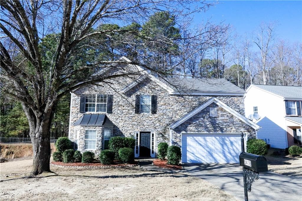 4 bedroom, 3 bathroom, 2,478 sq ft single family residence sold at 5418 Silver Springs Drive, Sugar Hill, GA 30518