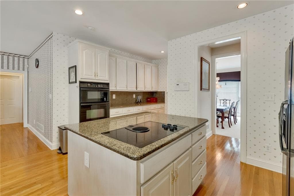 6 bedroom, 5 bathroom, 6,404 sq ft single family residence for sale at 205 Mill Run, Fayetteville, GA 30214 — photo 9