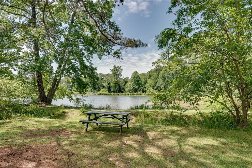 4 bedroom, 4 bathroom, 3,434 sq ft single family residence for sale at 4621 Lakeshore Drive, Pine Lake, GA 30072 — photo 2
