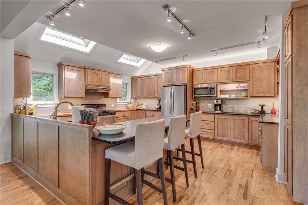 4 bedroom, 4 bathroom, 3,434 sq ft single family residence for sale at 4621 Lakeshore Drive, Pine Lake, GA 30072 — photo 6