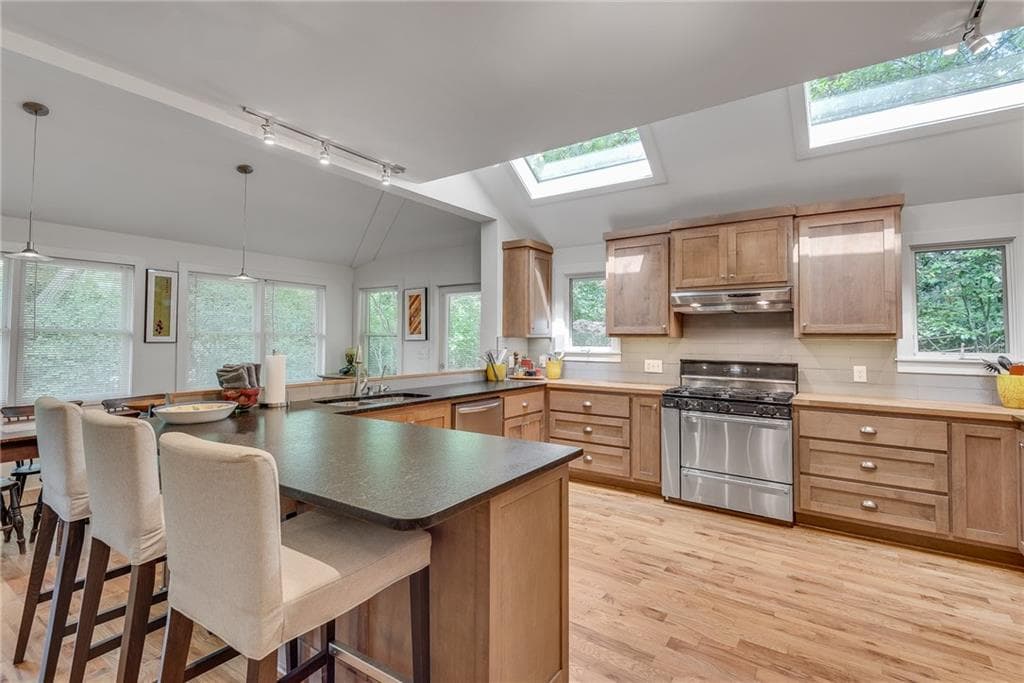 4 bedroom, 4 bathroom, 3,434 sq ft single family residence for sale at 4621 Lakeshore Drive, Pine Lake, GA 30072 — photo 8