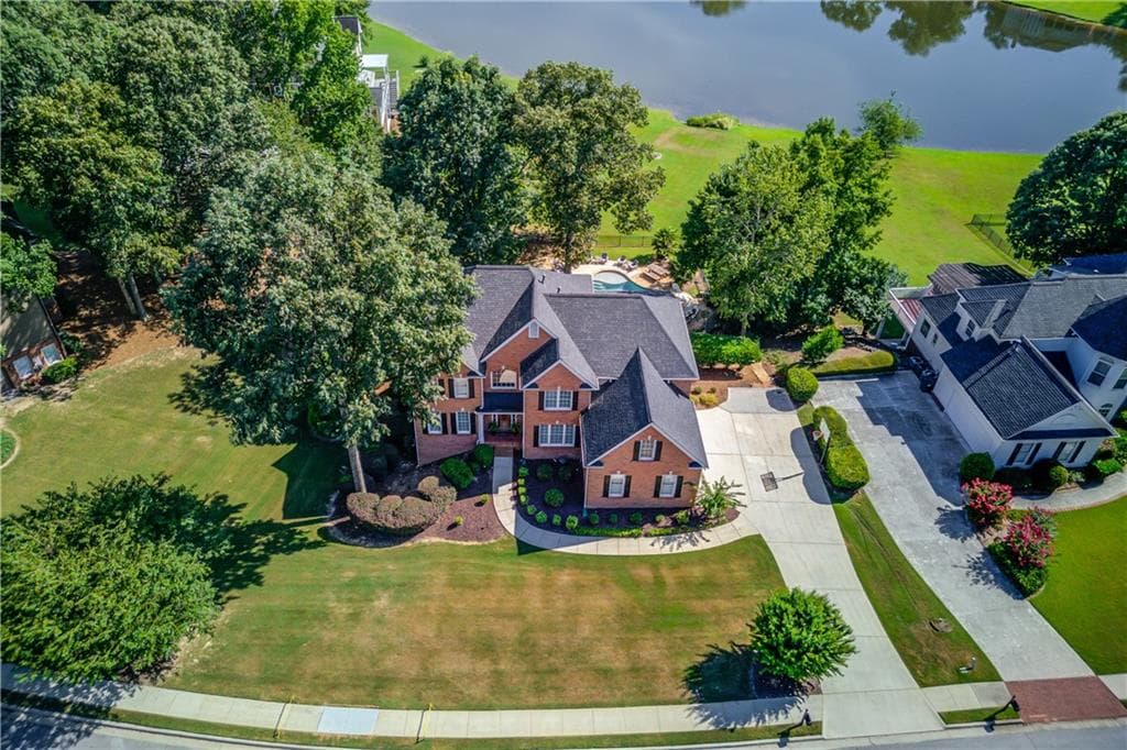 6 bedroom, 4 bathroom, 5,328 sq ft single family residence sold at 1668 Mulberry Lake Drive, Dacula, GA 30019
