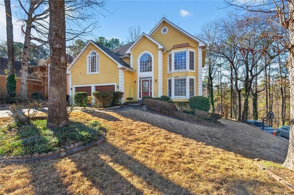 4 bedroom, 3 bathroom, 3,036 sq ft single family residence sold at 1412 Crooked Tree Circle, Stone Mountain, GA 30088