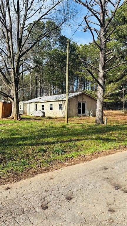 3 bedroom, 2 bathroom, 1,680 sq ft single family residence for sale at 508 Mckibben Road, Buchanan, GA 30113 — photo 2