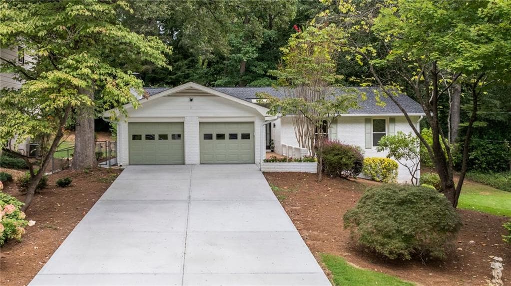 4 bedroom, 3 bathroom, 3,100 sq ft single family residence sold at 1566 Womack Road, Atlanta, GA 30338
