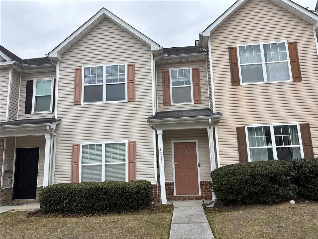 2 bedroom, 3 bathroom, 1,568 sq ft townhouse for sale at 2325 Bigwood Trail, Atlanta, GA 30349 — photo 1 of 17
