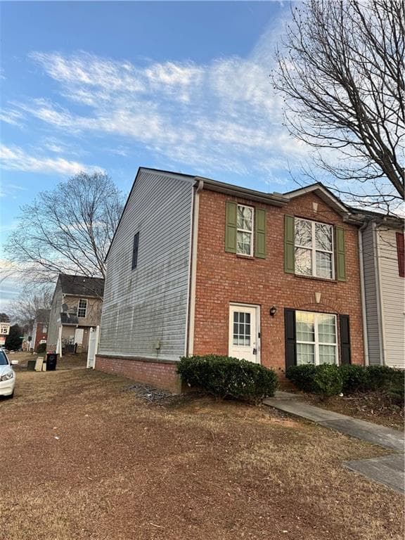 2 bedroom, 3 bathroom, 1,414 sq ft townhouse for sale at 1754 Grove Way, Hampton, GA 30228 — photo 2