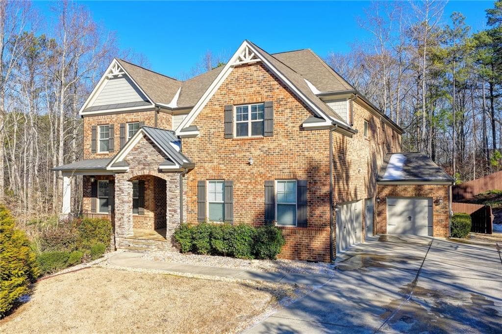 6 bedroom, 5 bathroom, 7,000 sq ft single family residence sold at 2025 Seneca Creek Drive, Cumming, GA 30041