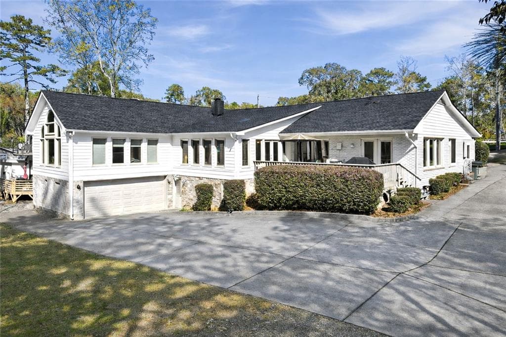 4 bedroom, 4 bathroom, 3,807 sq ft single family residence sold at 6558 Lanier Island Parkway, Buford, GA 30518