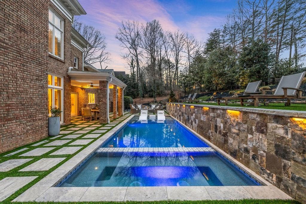 5 bedroom, 7 bathroom, 8,915 sq ft single family residence sold at 1450 Northwold Drive, Sandy Springs, GA 30350