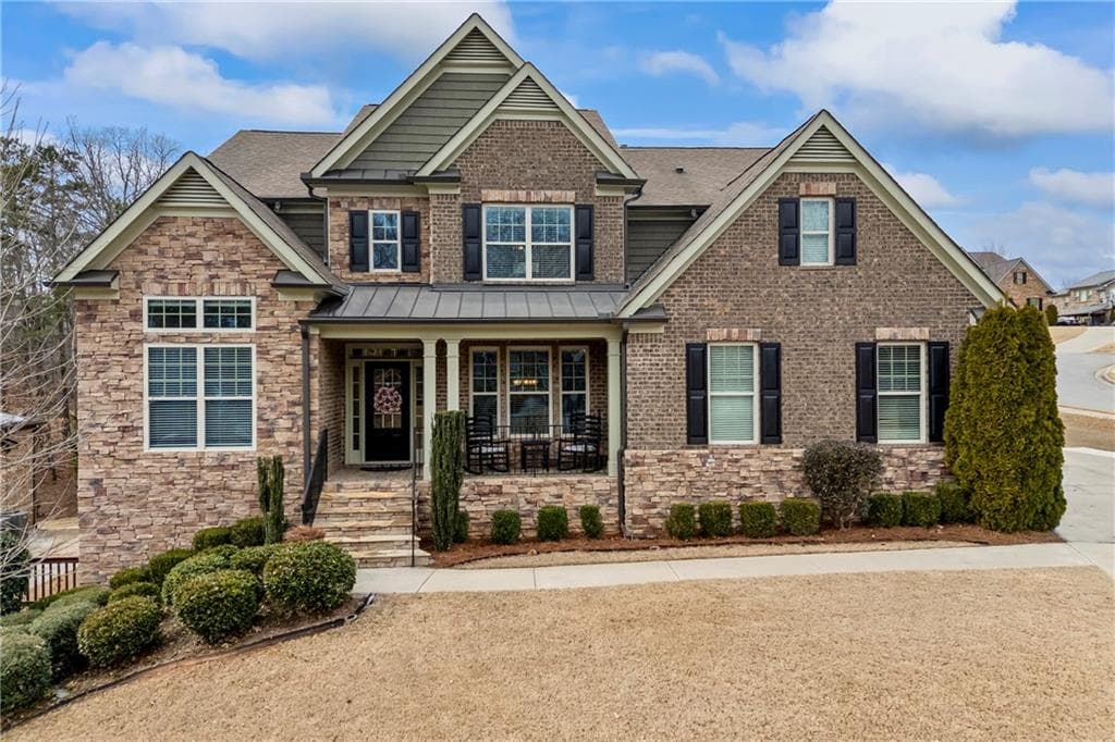 7 bedroom, 6 bathroom, 6,811 sq ft single family residence sold at 8910 Ellesmere Drive, Cumming, GA 30041