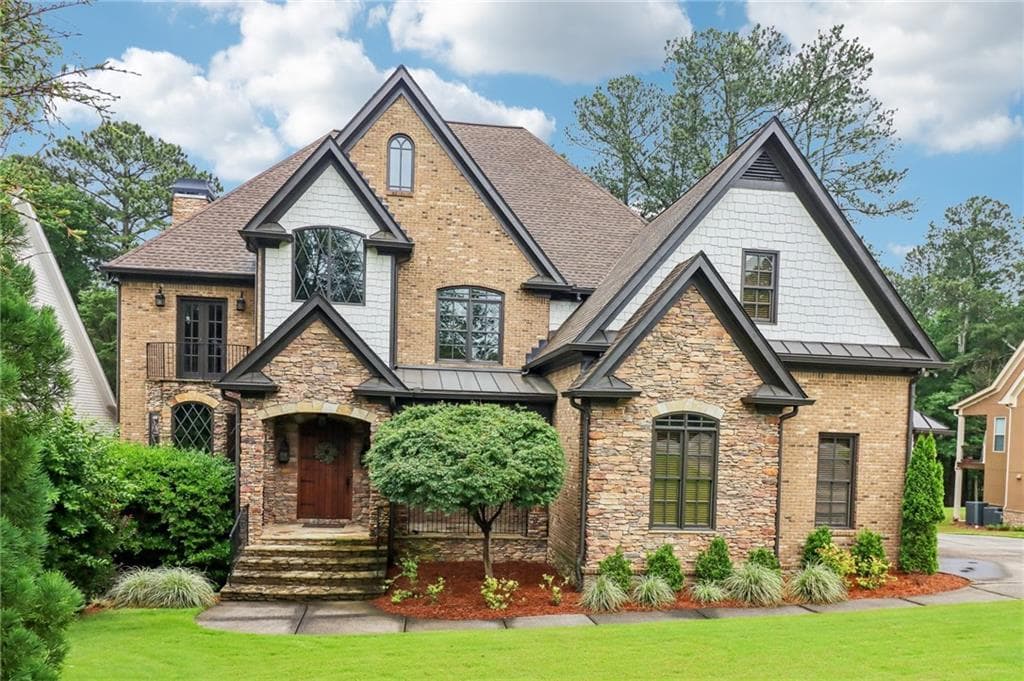 5 bedroom, 5 bathroom, 5,862 sq ft single family residence sold at 6219 Woodlake Drive, Buford, GA 30518