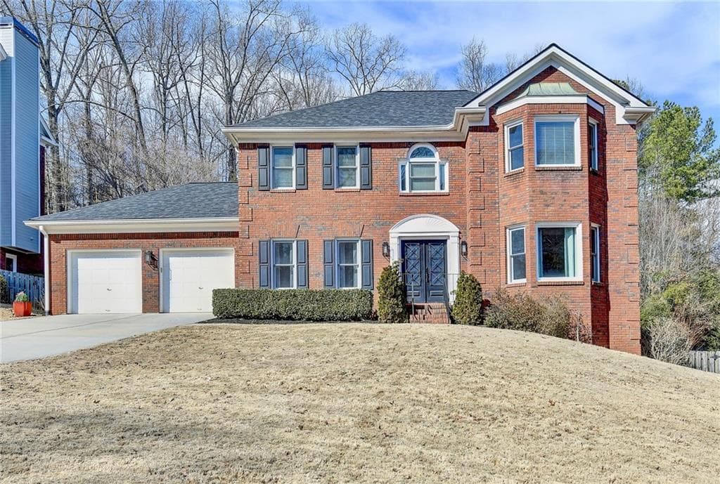 4 bedroom, 4 bathroom, 3,075 sq ft single family residence sold at 2980 Georgian Manor Drive, Johns Creek, GA 30022