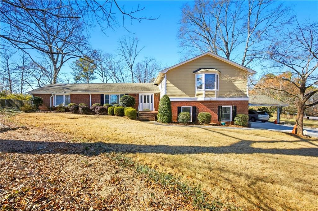 5 bedroom, 4 bathroom, 3,573 sq ft single family residence for sale at 297 Allen Court, Lilburn, GA 30047 — photo 1 of 42