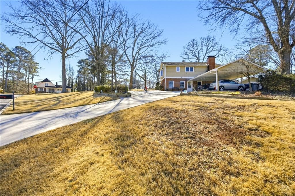 5 bedroom, 4 bathroom, 3,573 sq ft single family residence for sale at 297 Allen Court, Lilburn, GA 30047 — photo 2