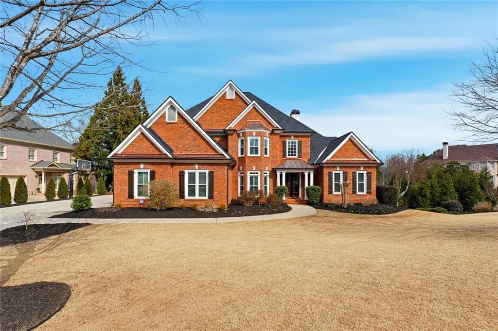 6 bedroom, 6 bathroom, 6,557 sq ft single family residence sold at 10150 Brixton Place, Suwanee, GA 30024