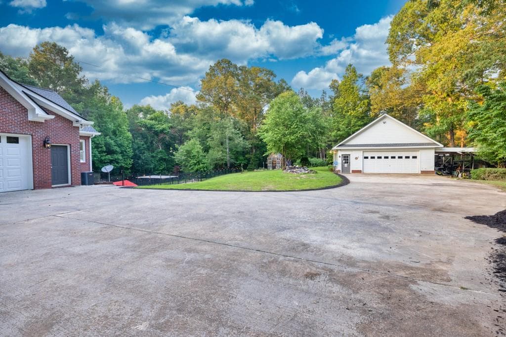 6 bedroom, 4 bathroom, 5,588 sq ft single family residence for sale at 2230 Ewing Chapel Road, Dacula, GA 30019 — photo 6