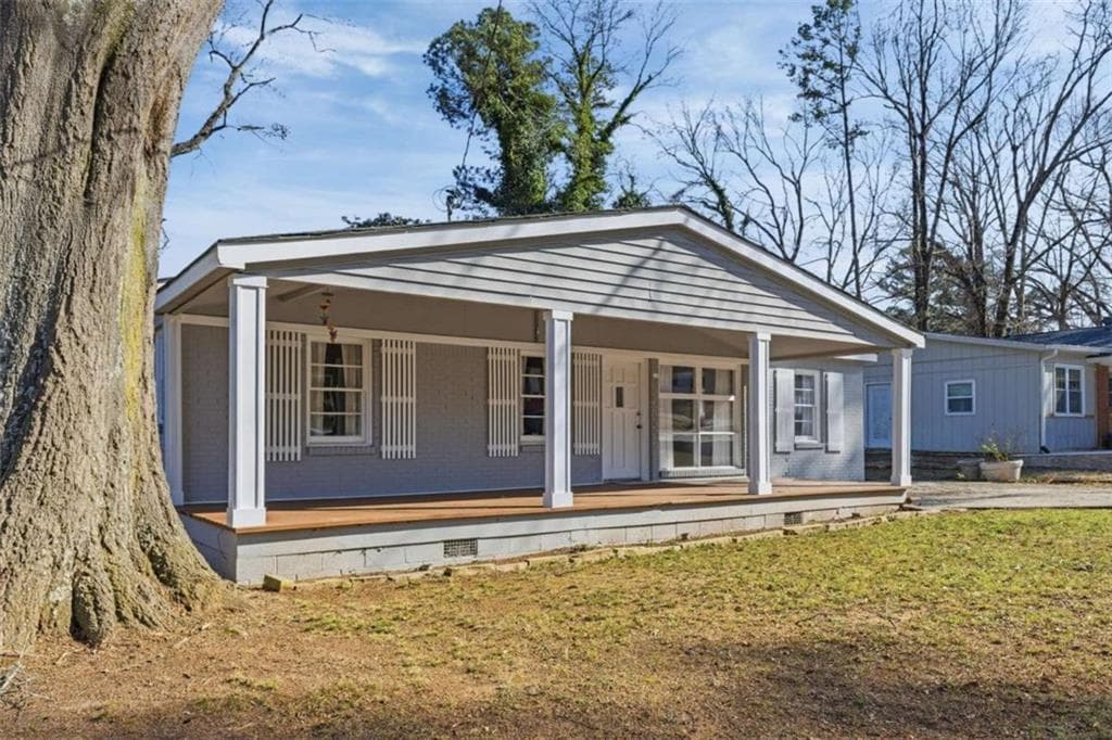 3 bedroom, 2 bathroom, 1,265 sq ft single family residence for sale at 4810 Bartlett Road, Forest Park, GA 30297 — photo 2