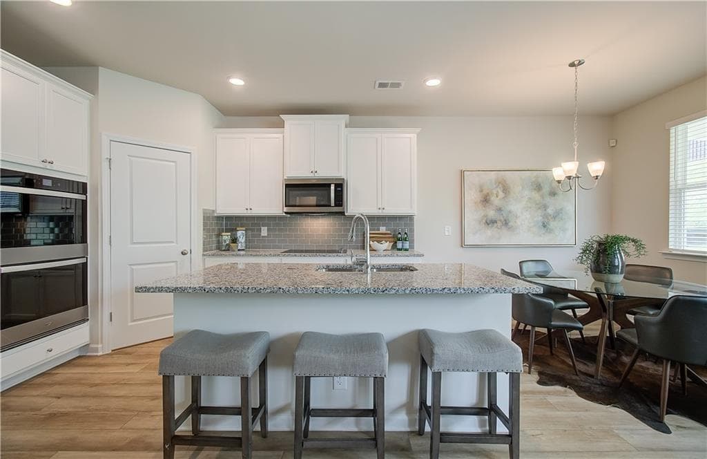5 bedroom, 4 bathroom, 2,892 sq ft single family residence for sale at 1119 Georgian Point Drive, Lawrenceville, GA 30045 — photo 9